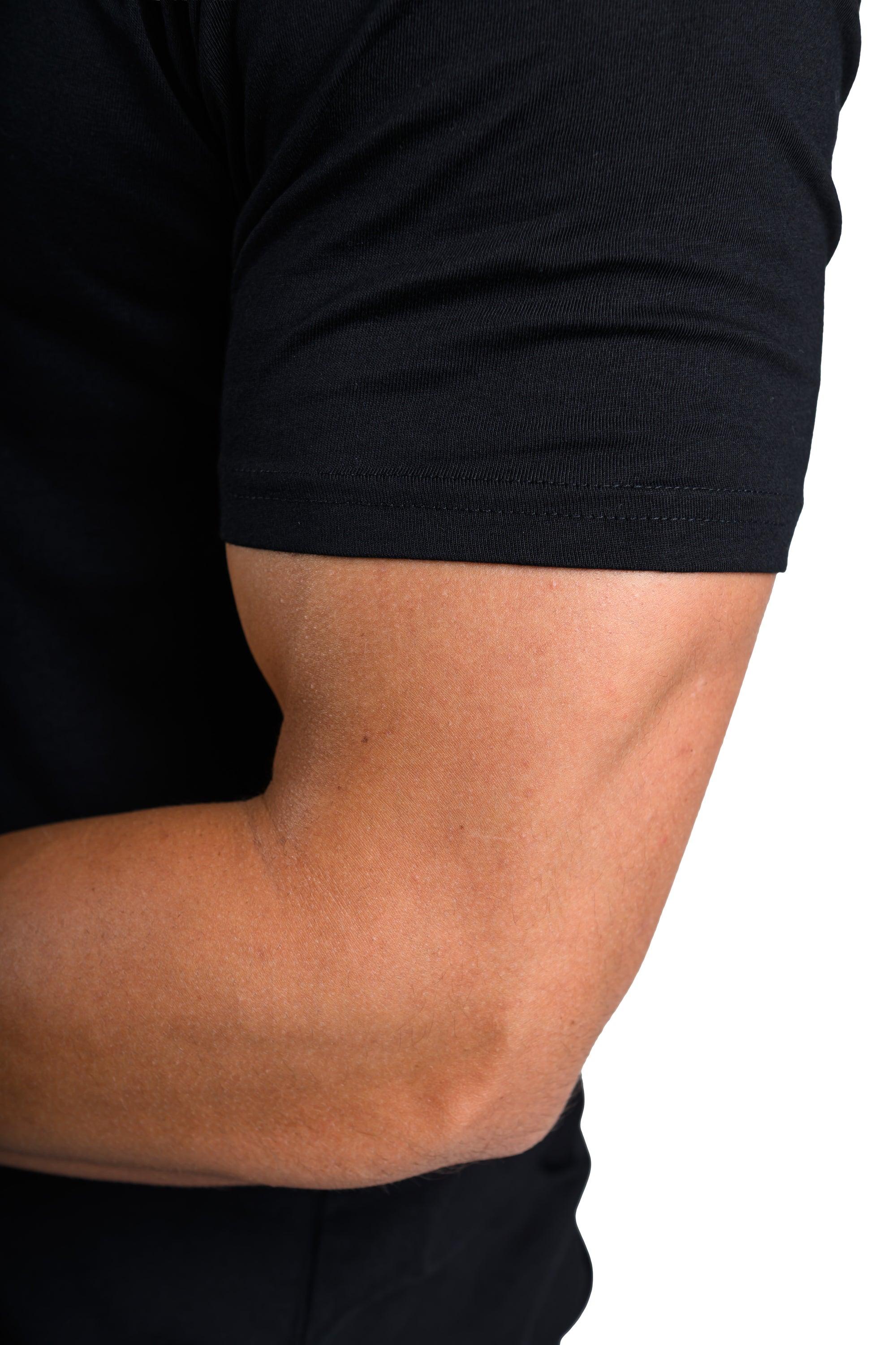 Close-up of a person wearing a black t-shirt on a white background