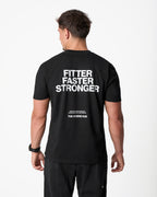 Person wearing a black t-shirt with 'Fitter Faster Stronger' text on the back, standing against a white background.