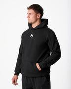 black hoodie on white background 