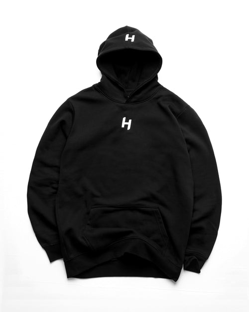 Black hoodie with a white 'H' logo on a white background