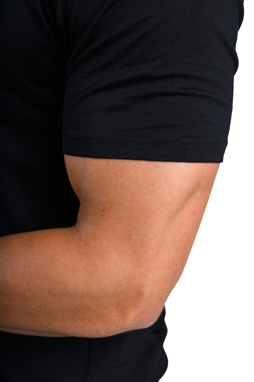 Close-up of a person wearing a black t-shirt on a white background